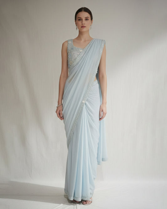 Pastel Blue Saree with Silver Embroidered Blouse – Elegant Festive Couture