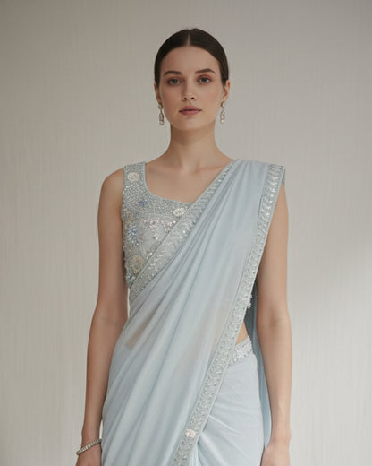 Pastel Blue Saree with Silver Embroidered Blouse – Elegant Festive Couture