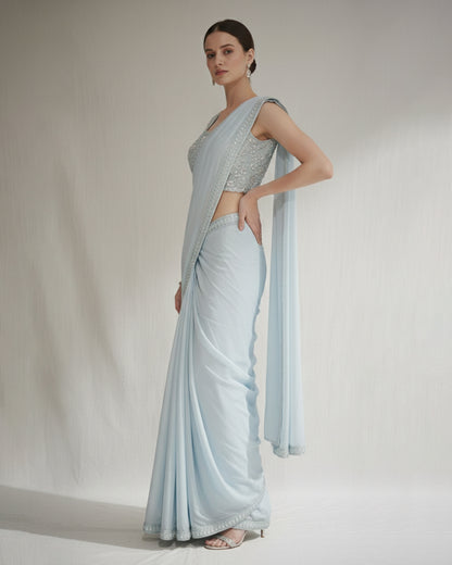 Pastel Blue Saree with Silver Embroidered Blouse – Elegant Festive Couture