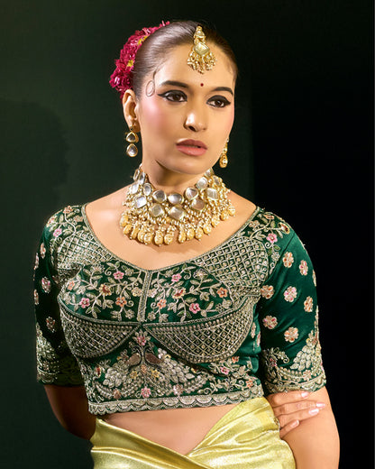 Golden Silk Saree with Green Embroidered Blouse – Regal Wedding Couture