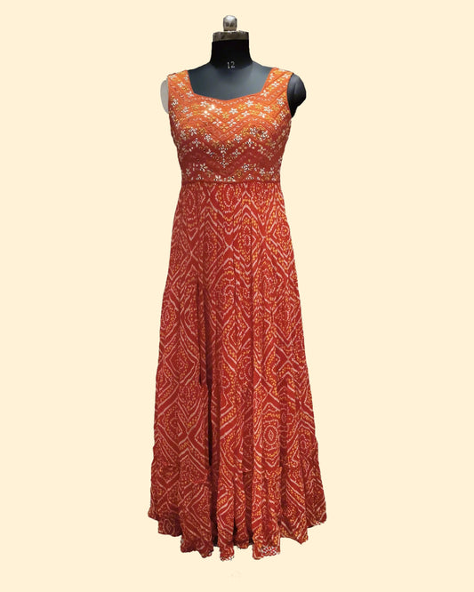 Sleeveless Bandhani-Style Gown with Mirror Work Flared Skirt – Cultural Elegance