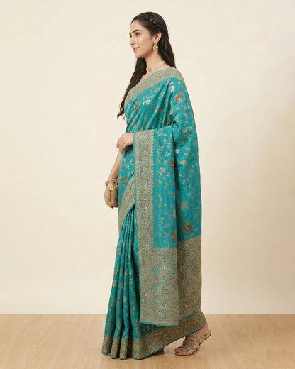 Turquoise Blue Silk Saree with Golden Floral Embroidery – Elegant Wear