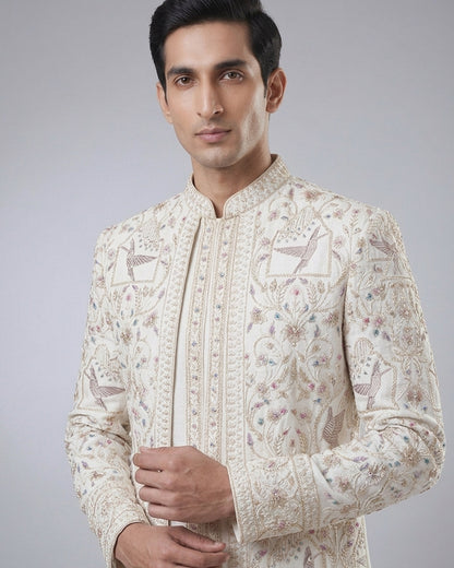 Cream Sherwani with Gold & Pastel Embroidery – Royal Wedding & Festive Attire