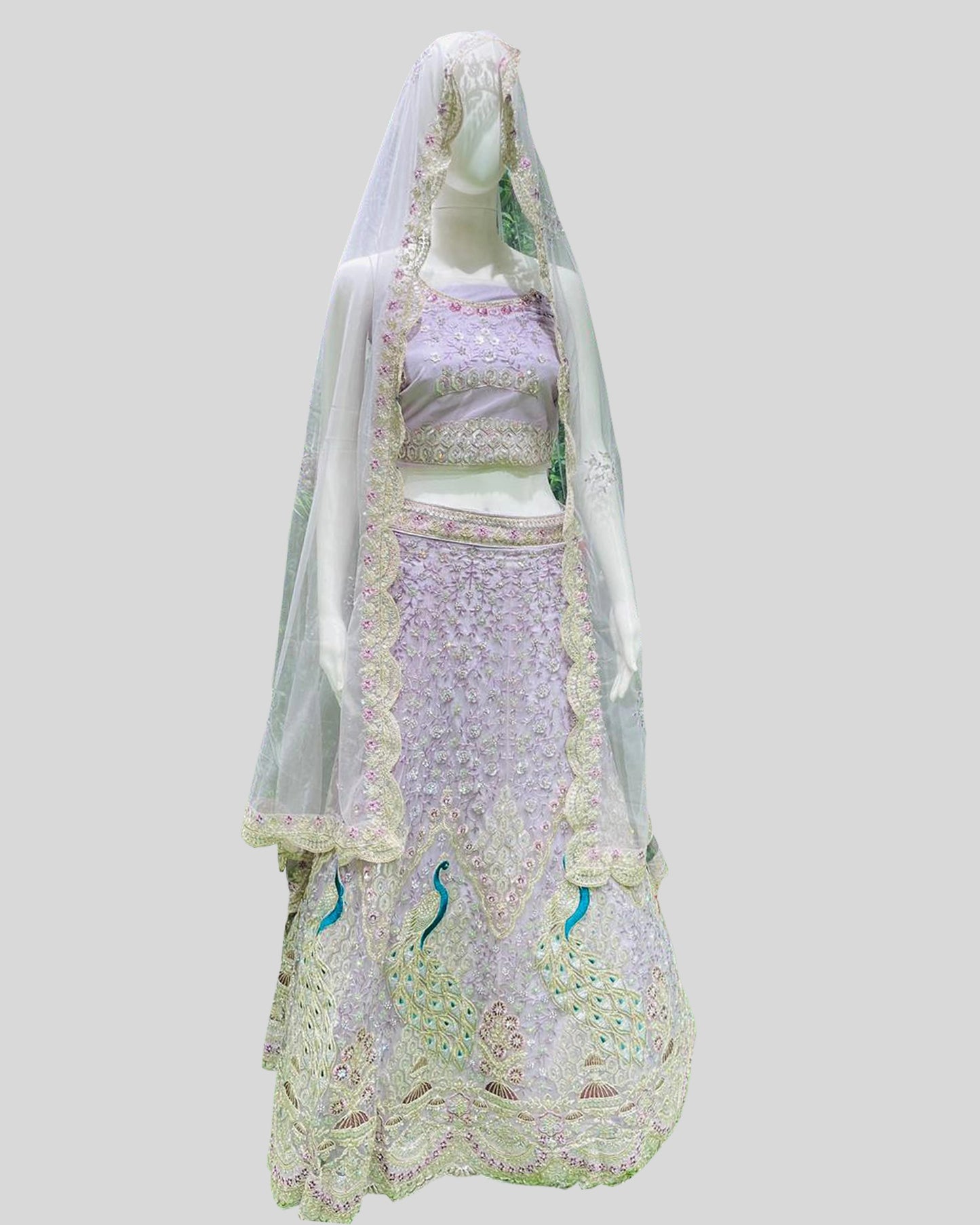 Peacock Whisper Bridal Designer Lehenga Choli – Regal Embroidery in Pastel Tones
