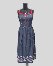 Crimson Folk Dress – Sleeveless Black Cotton Midi with Tribal Hemline