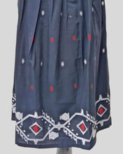 Crimson Folk Dress – Sleeveless Black Cotton Midi with Tribal Hemline