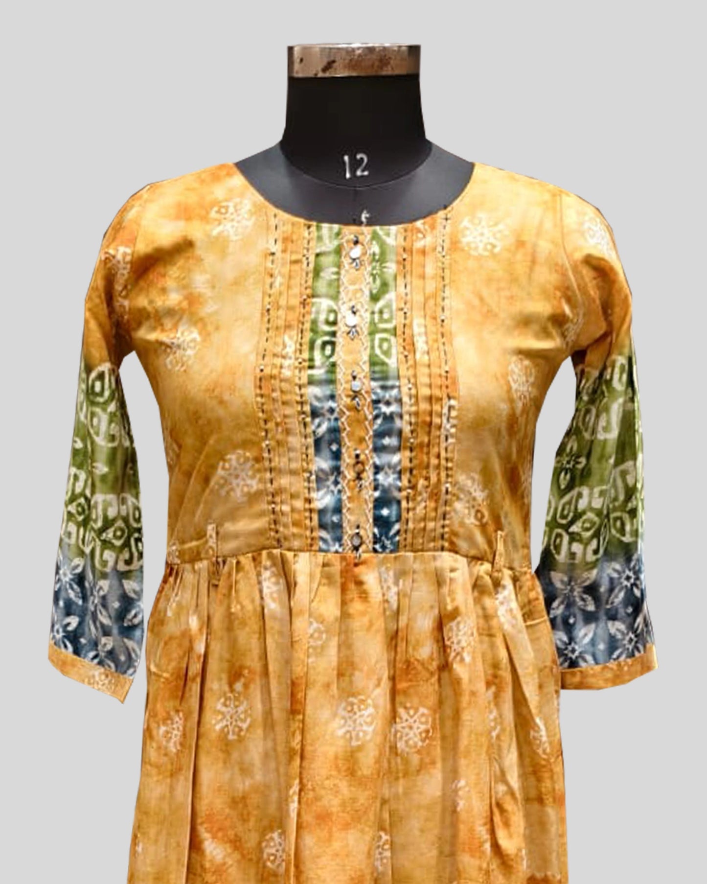 Golden-Yellow & Teal Printed Ethnic Dress – Pleated Bodice with Floral & Geometric Motifs
