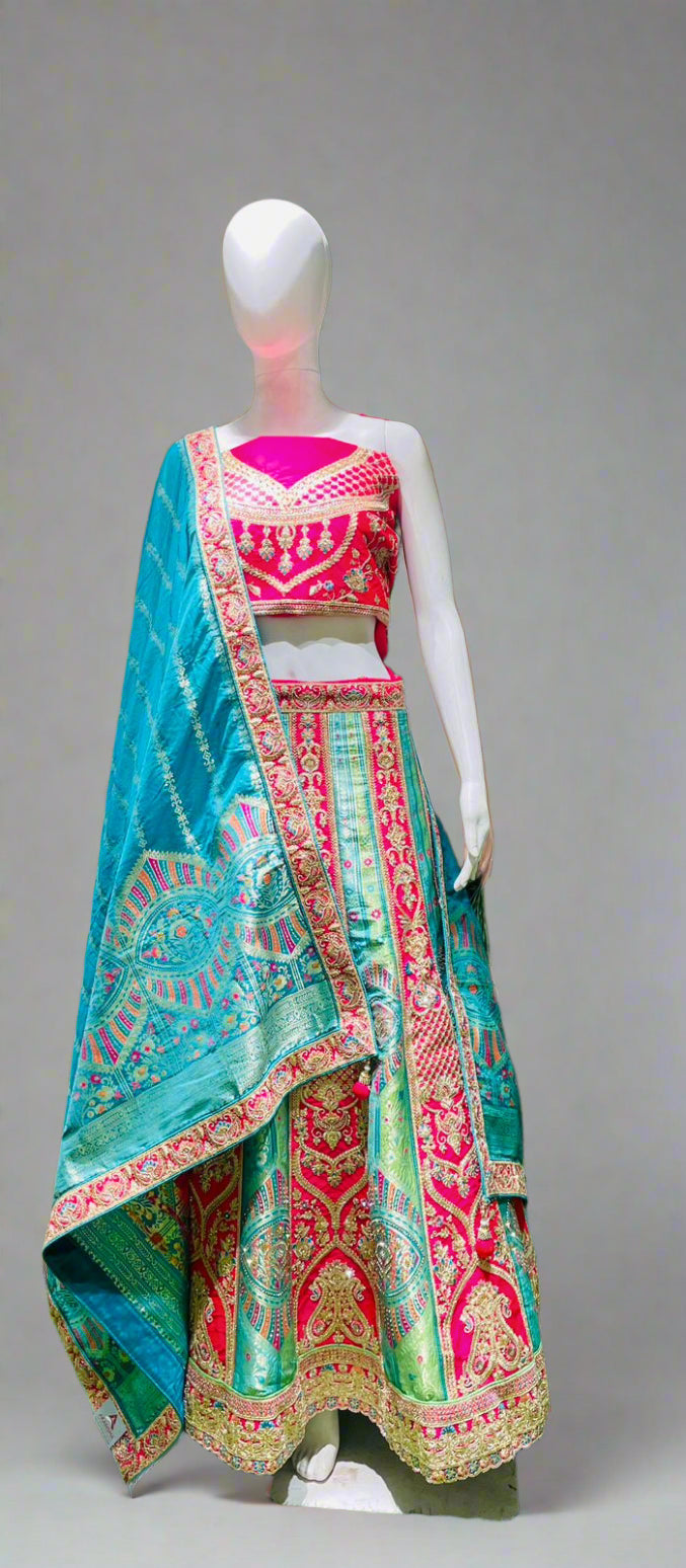Heritage Flame Lehenga Choli – Red & Green Embroidery with Regal Turquoise Accent