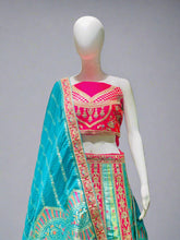 Heritage Flame Lehenga Choli – Red & Green Embroidery with Regal Turquoise Accent